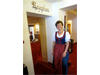 Hotel Staff in Color Austrian traditional dress greats 
                        visitors