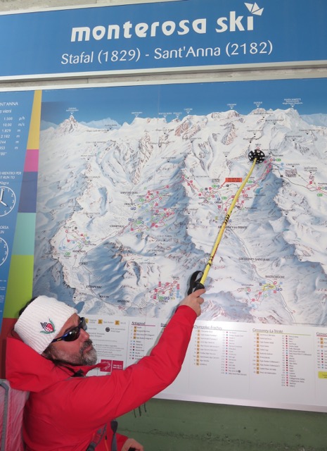 A Monte Rosa guide describes to skiers the days ski route 