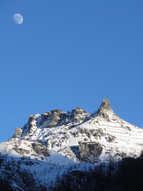 The rising moon over the Monte Rosa Massif. 
