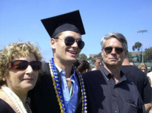 Louis Topper celebrates with mother Wendie and father Frank