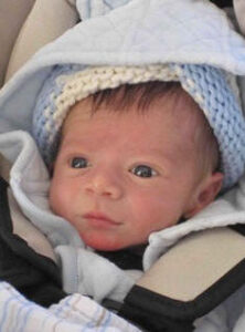 A year and a half later, proud grandfather Mickey sent us this message-This new baby, Jacob Ellis Bachrach is the wonderful result of that white ski outfit that Hollis sent to us in 2008.

The suit must have been magical.