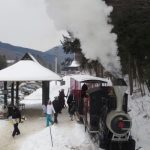 Skiers & riders arrive aboard Loons Steam train at base area RR station at Loon. The 1934 circa train hauls skiers and tourists between base areas at Loon Mt Loon Mountain Steam Train