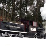 John Henry Steam engine at Loon Mt. The wood fired steam train hauls skiers and riders between base areas at Loon John Henry Steam engine at Loon Mountain