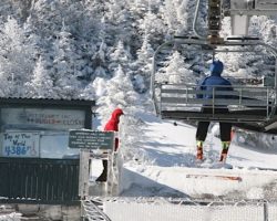Lift Hut atop Summit Chair with Local Signage. Lift Hut atop Summit Chair with Local Signage.