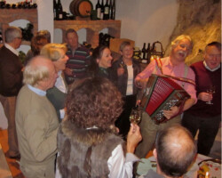 Apre Skiing is a large part of the Austrian life as skiers enjoy local musicians in local stubes and bars making memories of their ski experience Austria
