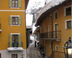 Courmayer, IT-Mountain village near Courmayer, IT with colorful hotels and village setting Courmayer, IT-Mountain village near Courmayer, IT with colorful hotels and village setting